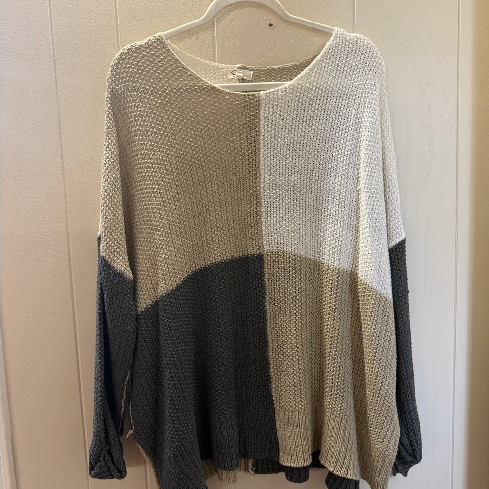 effortless neutral light weight sweater cozy and relaxed fit for spring